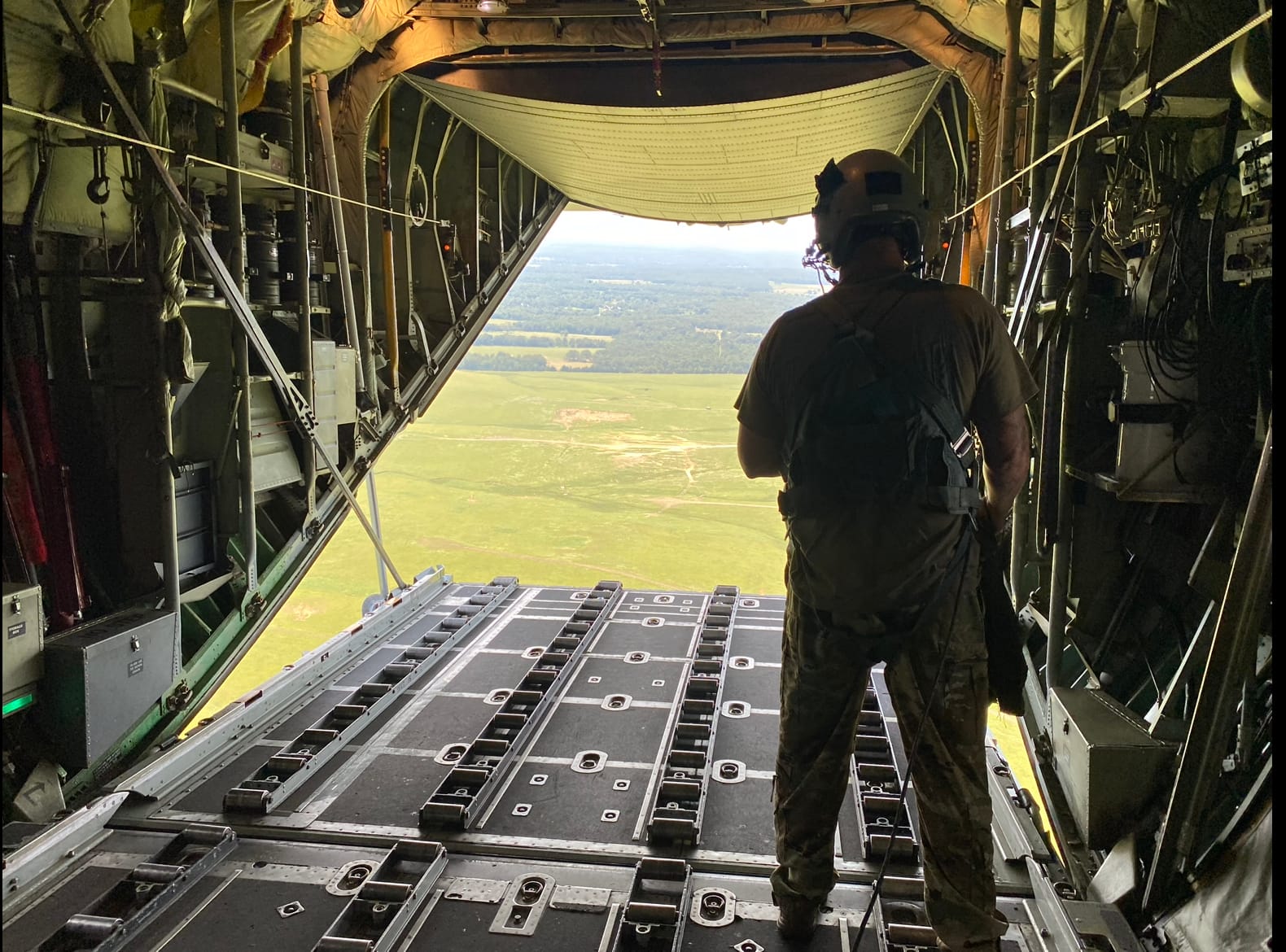 C-130 rear ramp open in flight during Air Force service