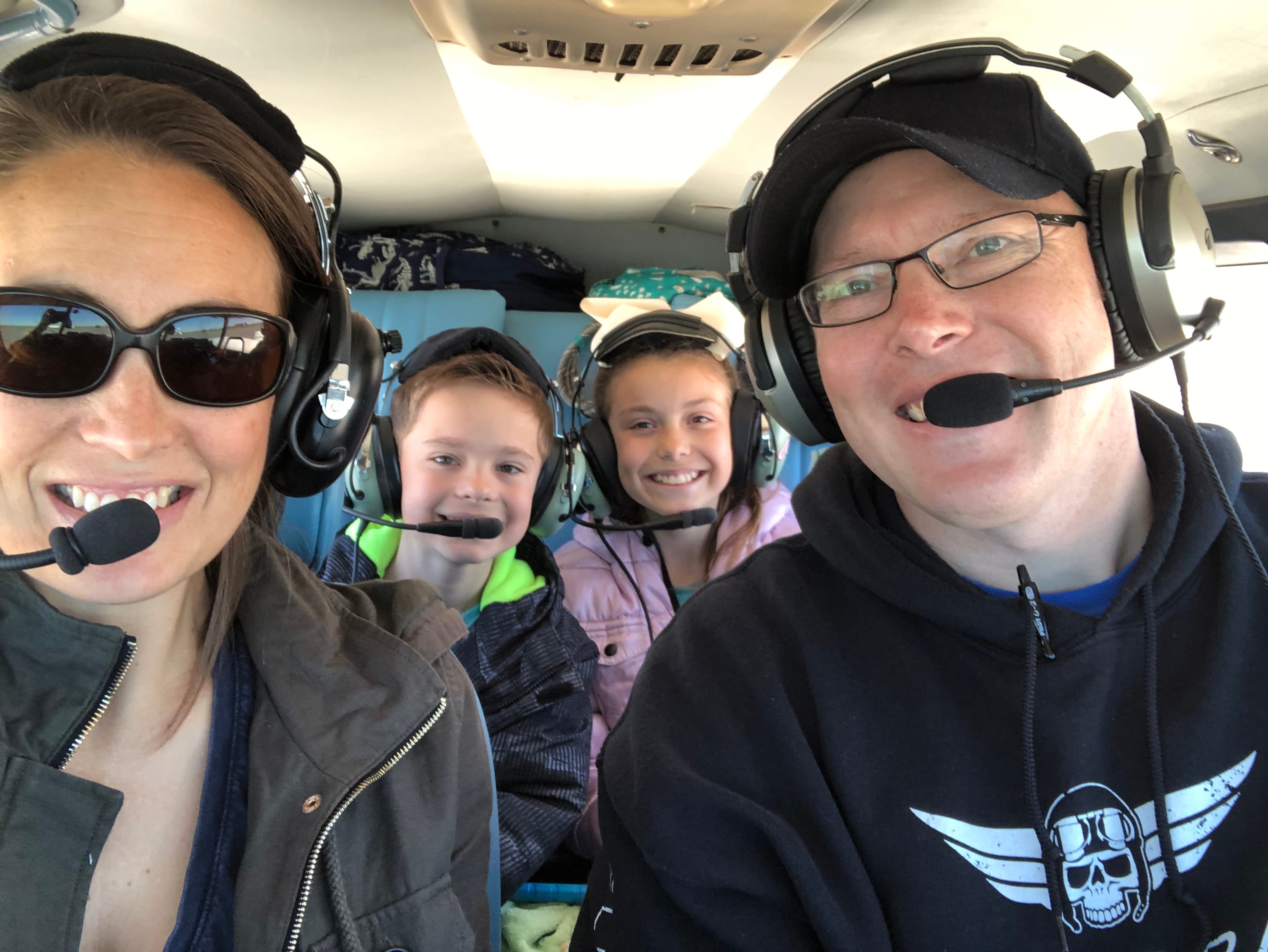 Travis and his family flying together