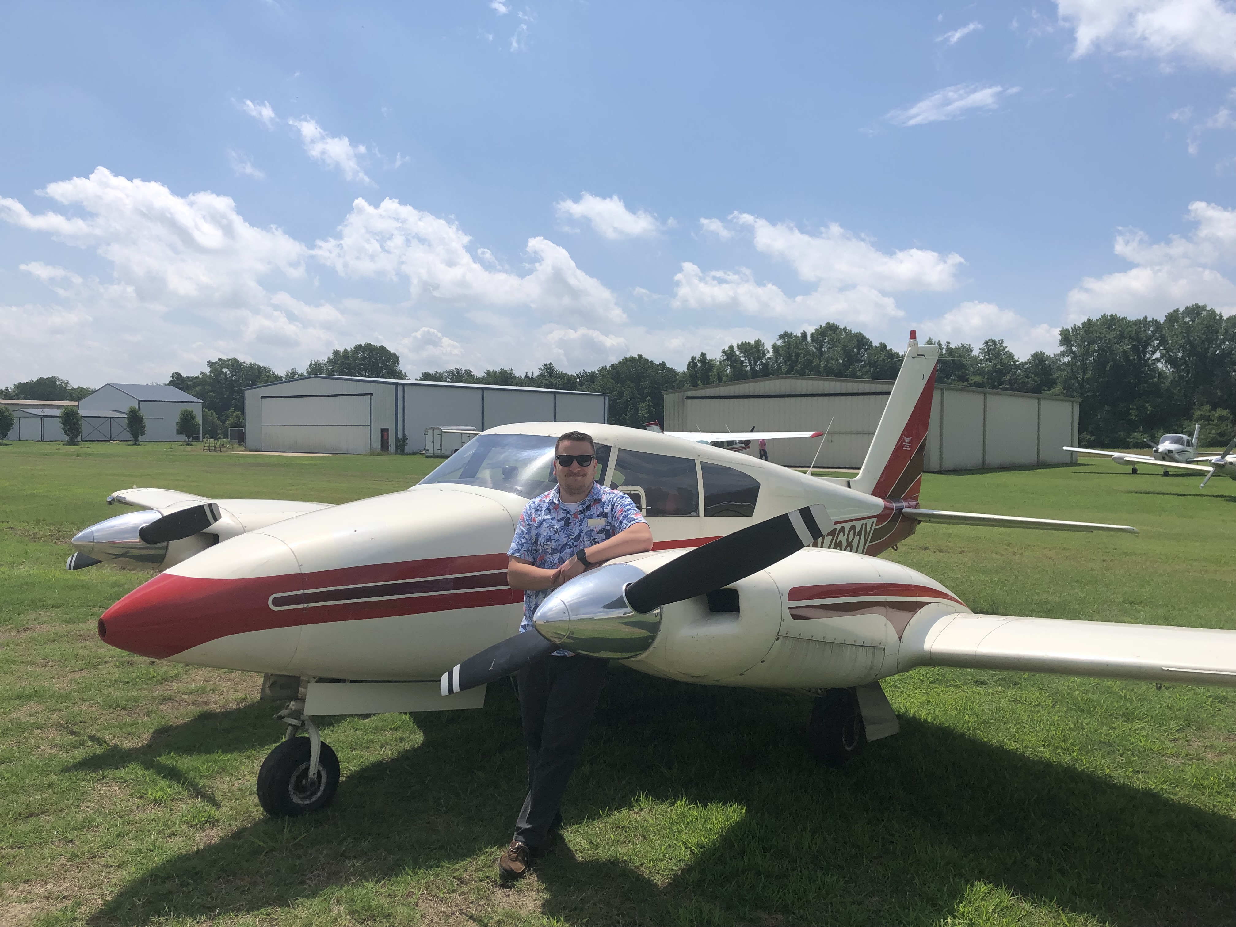 Travis Alkire at 1AR9 Country Air with a twin-engine Piper